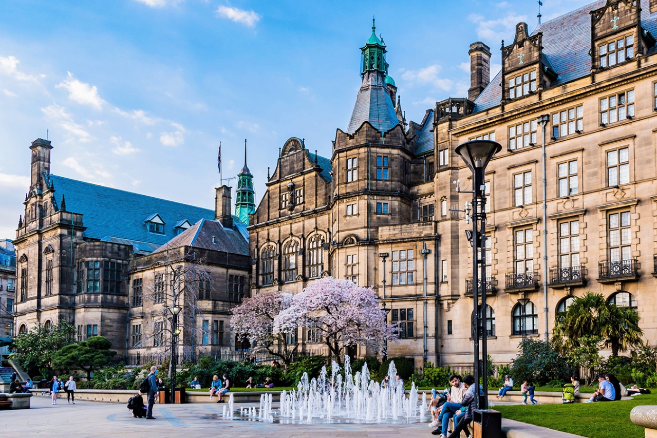 The Peace Gardens on a spring afternoon. It is a square in the center of the city of Sheffield, England. The gardens adjoin the gothic Sheffield Town Sheffield United Kingdom